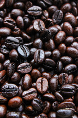 Pile of roasted coffee beans. Coffee beans background
