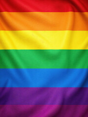 Fototapeta premium Close-up of colorful rainbow LGBTQ+ pride flag with soft fabric folds, isolated on white, symbolizing visibility and equality