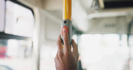 Button, hand and stop with person on bus for commute, public transportation or travel to...