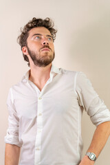 Fototapeta premium Ambitious young businessman looking up - leadership and confident vision of future