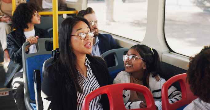 Travel, mom and daughter in bus, talking and commuting in morning, smile and public transport in city. Happy, woman and child in vehicle for journey, family and bonding with conversation on trip