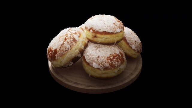 Looping animation around a composition of European classic donuts lying on a wooden board. Loop motion. Alpha Channel. Close-up.