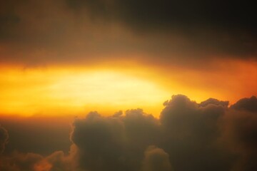 Warm and cozy clouds at sunset, a peaceful scene.