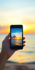 Capturing a vibrant sunset on a modern smartphone at the beach