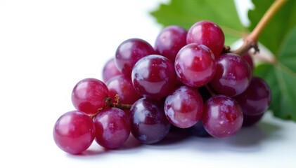 Fototapeta premium Cluster of ripe purple grapes, isolated on white , sweet, berries