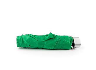 Compact folded umbrella isolated, small green parasol, old umbrella