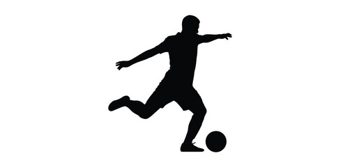 Silhouette of a Soccer Player Kicking a Ball