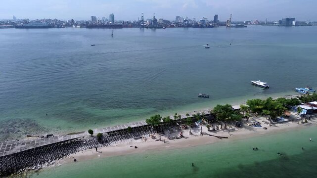 Where Ocean Meets Coral: Aerial Journey Over Gusung Island