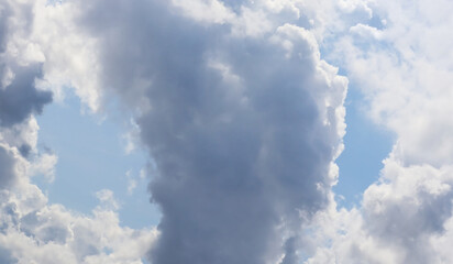 Closeup aerial view of dramatic cloudscape show variety of silhouette form,void and texture with beautiful tropical summer bright blue sky.
