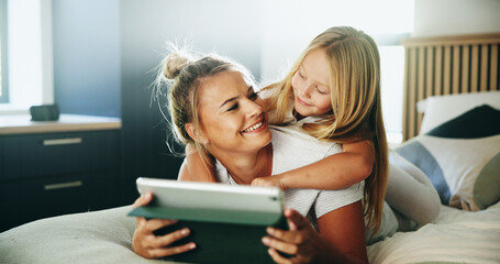 Happy mom, kid and relax with tablet on bed for online entertainment, show or cartoon at home....