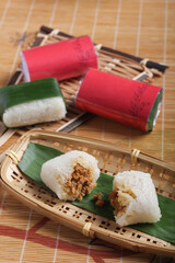 indonesian traditional glutinous rice snack lemper with shredded chicken fillings