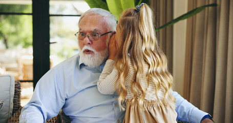 Whisper, child and grandpa in home, secret and surprised by gossip in living room, fun or listening. House, elderly man and granddaughter with confidential news, bonding or shocked by rumor in lounge