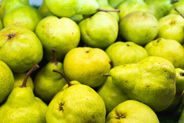 Fresh green pears sold in supermarket.