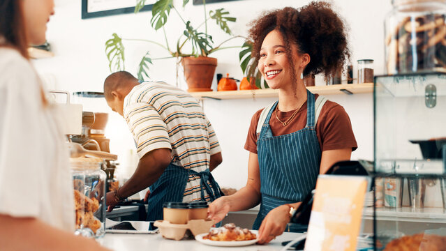 Service, croissant and woman with customer at cafe counter for serving, help and purchase breakfast. Restaurant, hospitality and waiter with client for pastry, sweet treats or baked food for takeaway