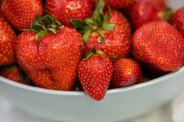 Close-up of Fresh, Ripe Strawberries in a White Bowl