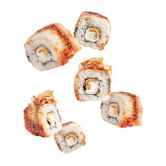 Levitation or flying of cut slices of unagi maki or sushi rolls made from eel fish, boiled rice,...