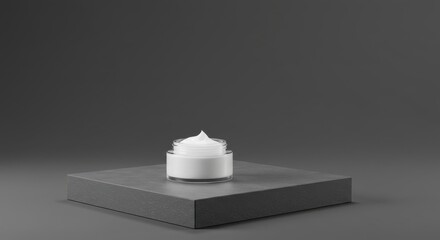 Minimalist beauty cream jar on a sleek gray surface with soft lighting