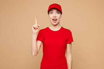 Professional delivery girl employee woman wear red cap t-shirt uniform workwear work as dealer...