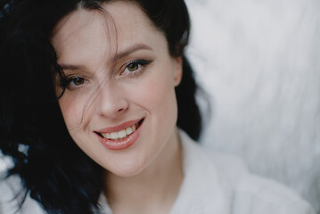 Portrait of a young woman smiling tenderly