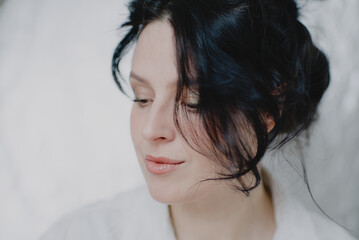 Portrait of a young woman smiling tenderly