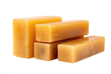 Stacked blocks of light golden-yellow soap