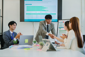 Asian corporate business team and managers at a meeting
