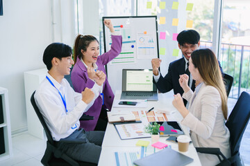 Fototapeta premium Team of Asian business people and working together in office, Startup projects and business presentation at meeting room.