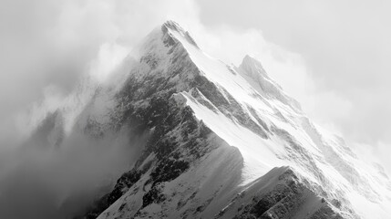 Obraz premium A dreamlike black and white snowy mountain peak