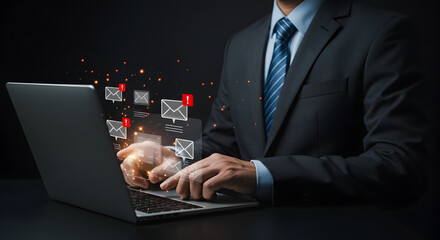 Businessman Typing on Laptop Surrounded by Glowing Email Icons in Digital Communication on Black Backdrop