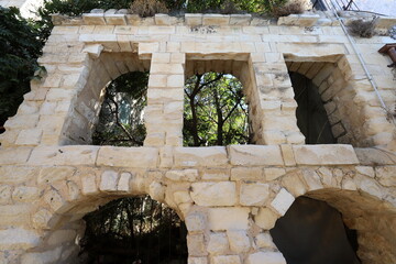 Ruins of old houses in the center of a big city