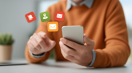 Close-up of person interacting with mobile phone and app icons 