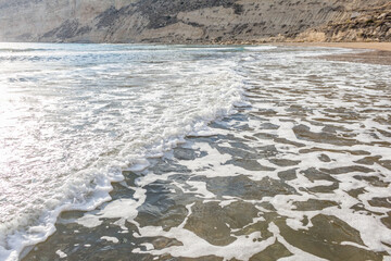 waves on the sandy beach of Cyprus..