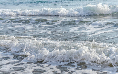 waves on the sandy beach of Cyprus..
