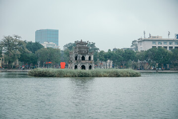 Turtle Tower on Hoan Kiem Lake in cloudy weather, landmark of Hanoi, Vietnam