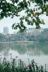 Turtle Tower on Hoan Kiem Lake in cloudy weather, landmark of Hanoi, Vietnam