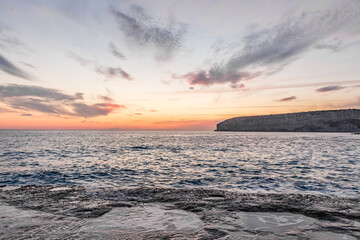 Fototapeta premium Dramatic Sunset Highlights Azure Ocean Beauty.