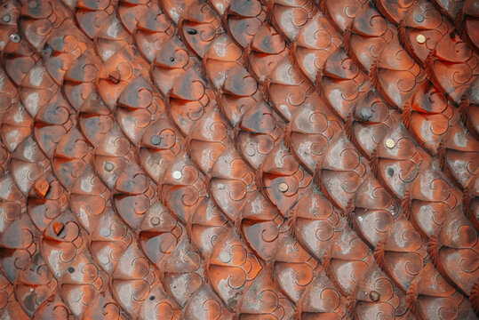 The tiled roof of the pagoda at the Temple of Literature after the rain in Hanoi, Vietnam. Abstract background