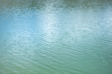 raindrops on water surface, rainy season