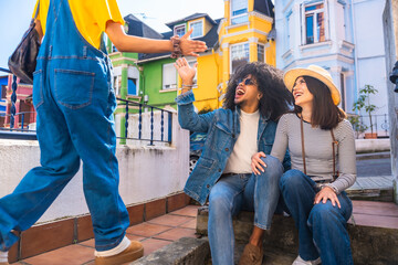 Tourists greeting local woman in colorful neighborhood