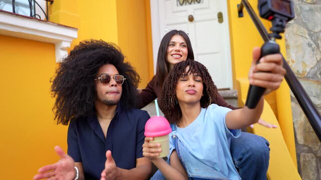 Young influencers create dynamic content for their online audience, enjoying beverages and showcasing their vibrant personalities