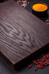 Wooden cutting board blank as a backdrop for cooking in the kitchen