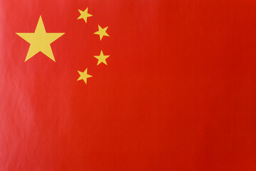 China, Chinese red flag with stars as background