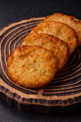 Potato hash browns, a meal with onions, cabbage in the form of fritters