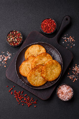 Potato hash browns, a meal with onions, cabbage in the form of fritters