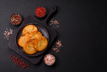 Potato hash browns, a meal with onions, cabbage in the form of fritters