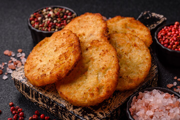 Potato hash browns, a meal with onions, cabbage in the form of fritters