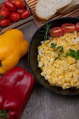 Scrambled eggs in metal pan