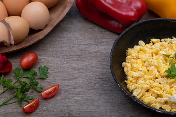 Scrambled eggs in metal pan