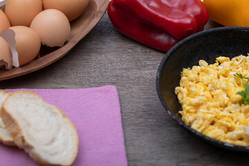 Scrambled eggs in metal pan