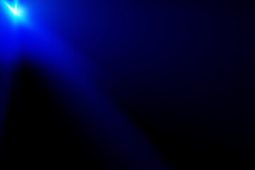 Blue light beam on dark background. Abstract blue glow. Modern era technology background concept.